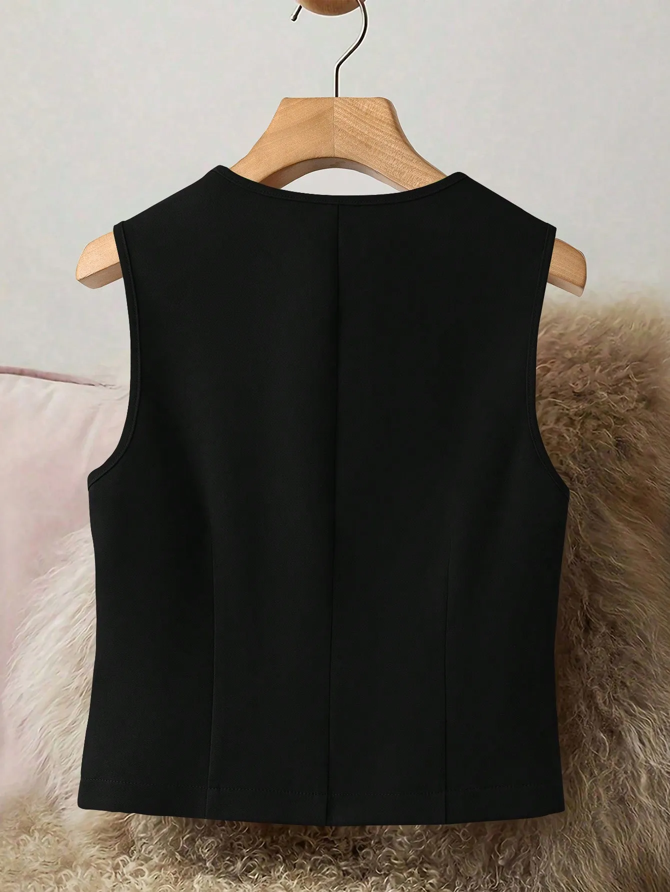 Chaqueta elegante sin mangas para mujer