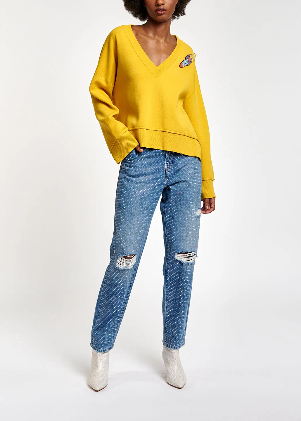 Distressed rhinestone-embellished jeans