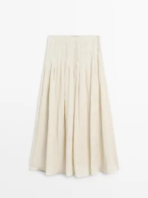 Flowing midi skirt with box pleats