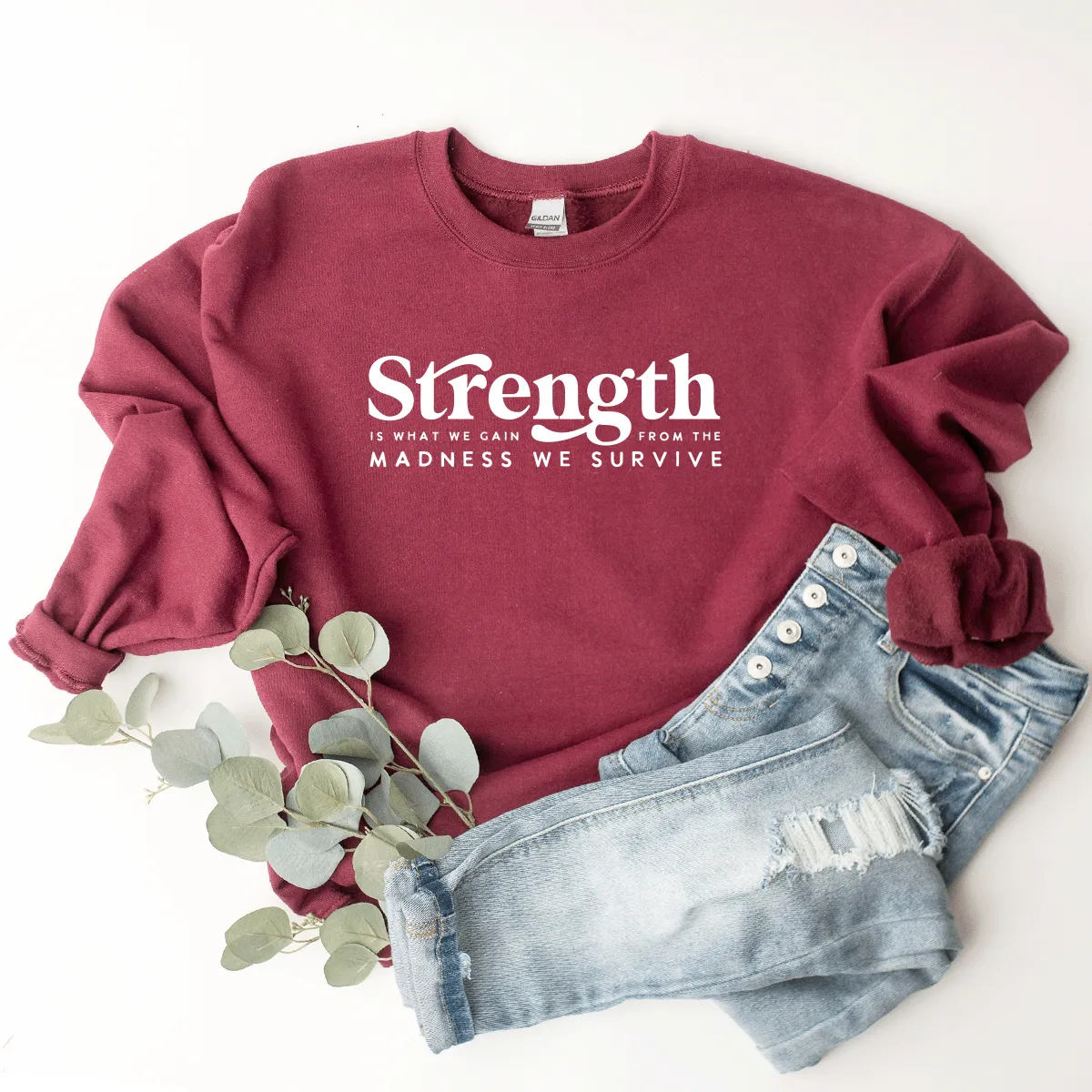 Strength Is What We Gain From The Madness We Survive - Sweatshirt