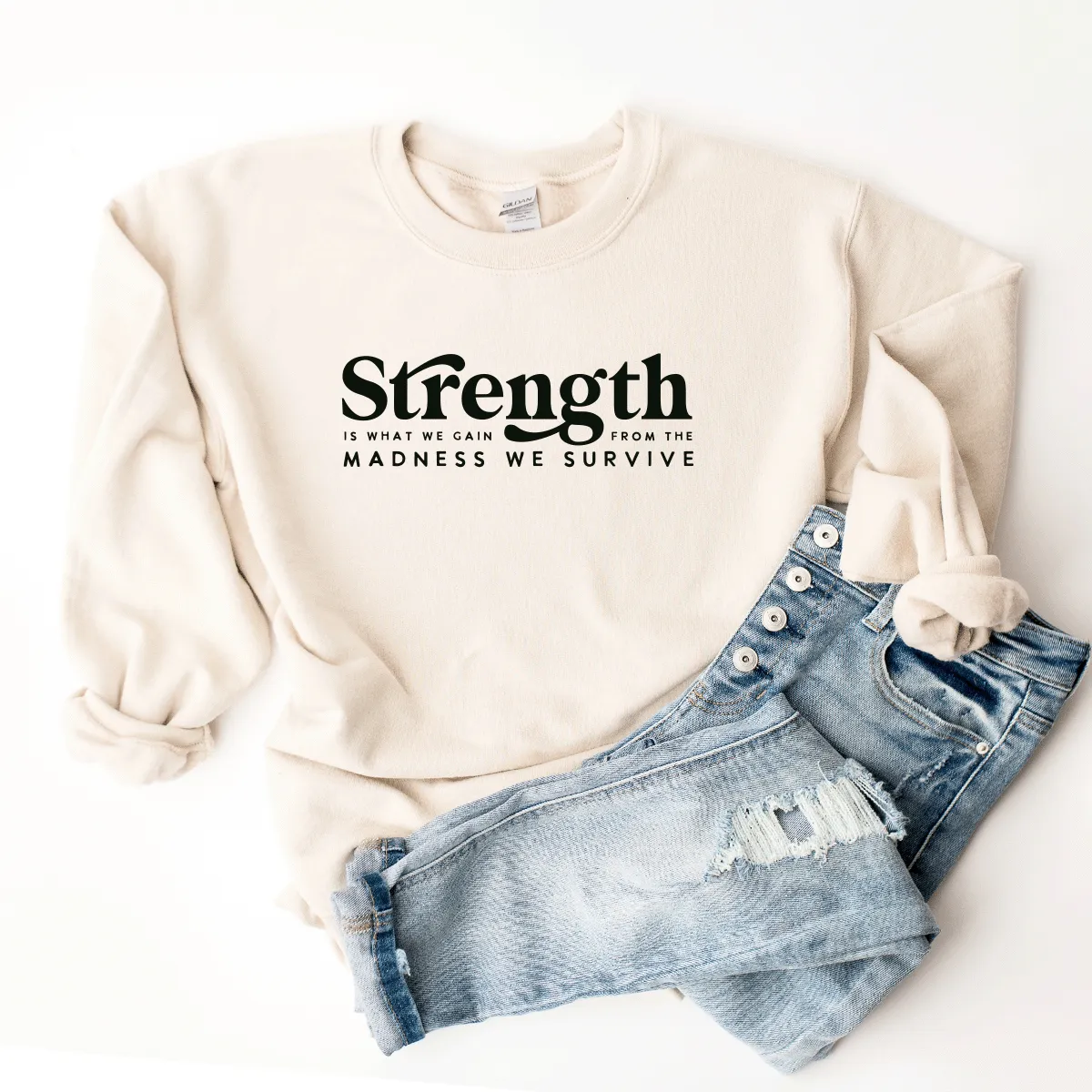 Strength Is What We Gain From The Madness We Survive - Sweatshirt