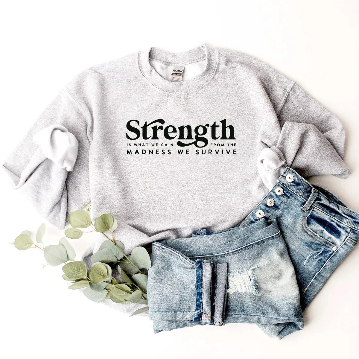 Strength Is What We Gain From The Madness We Survive - Sweatshirt